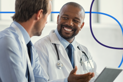 African American physician interviewing white Caucasian male physician