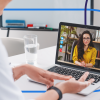 young woman interviewing for medical professional role via video call with medical professional