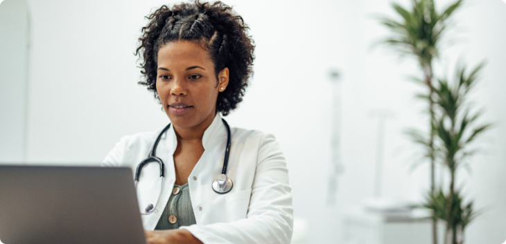 Physician using a laptop