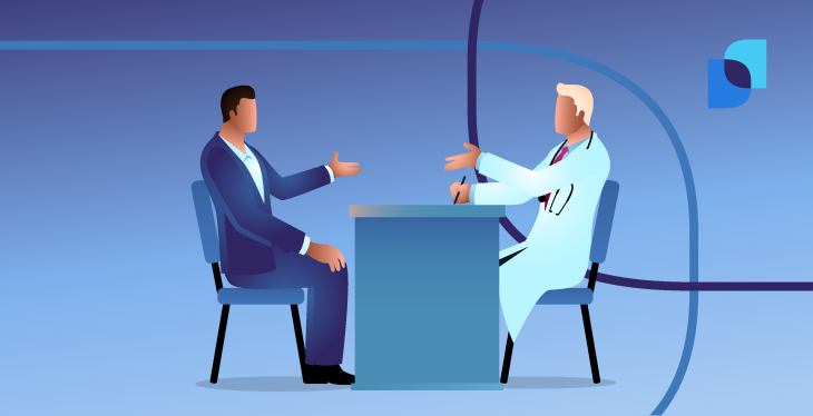 Job candidate discussing interview questions with healthcare recruiter at desk