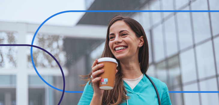 smiling CRNA enjoying a coffee break outdoors in scrubs, representing work-life balance for nurse anesthetists