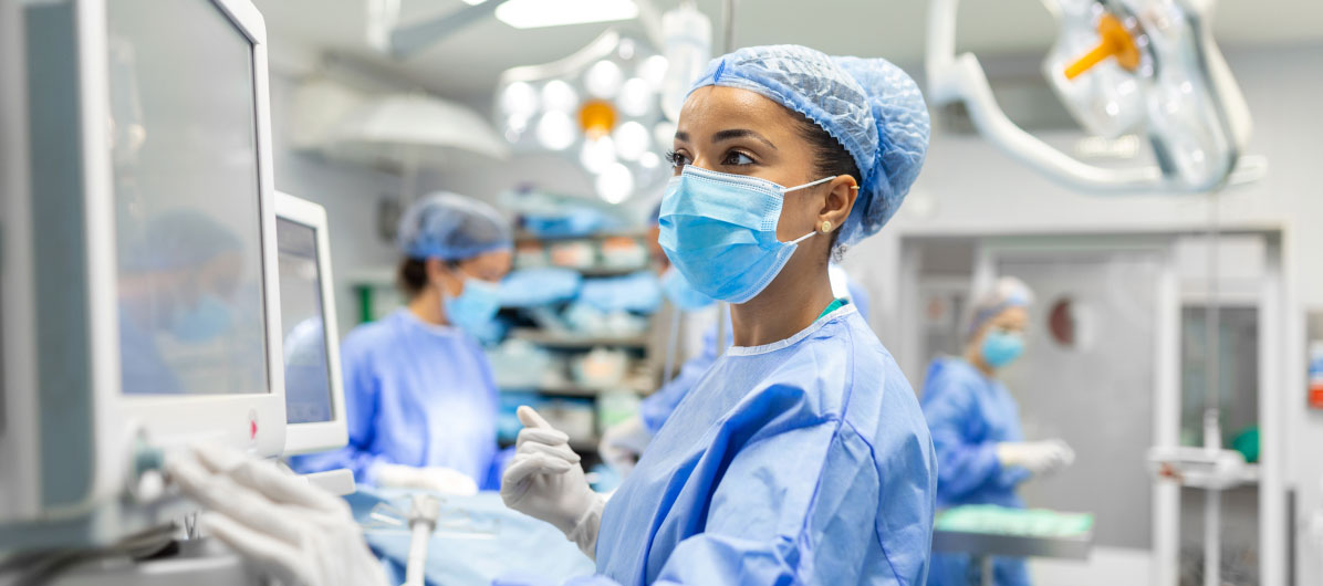 Female doctor looking at monitor