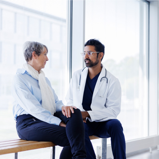 Doctor with older patient